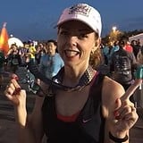 Woman celebrates after marathon with medal